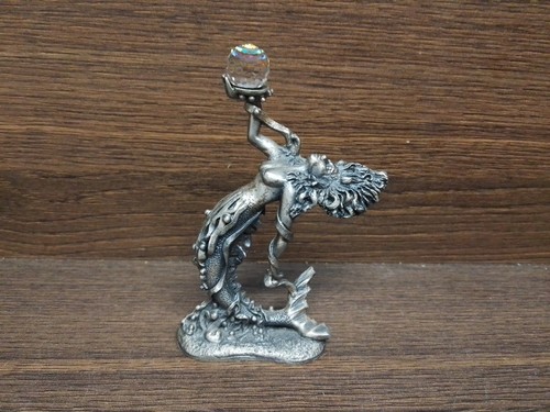 The siren figure - figure,